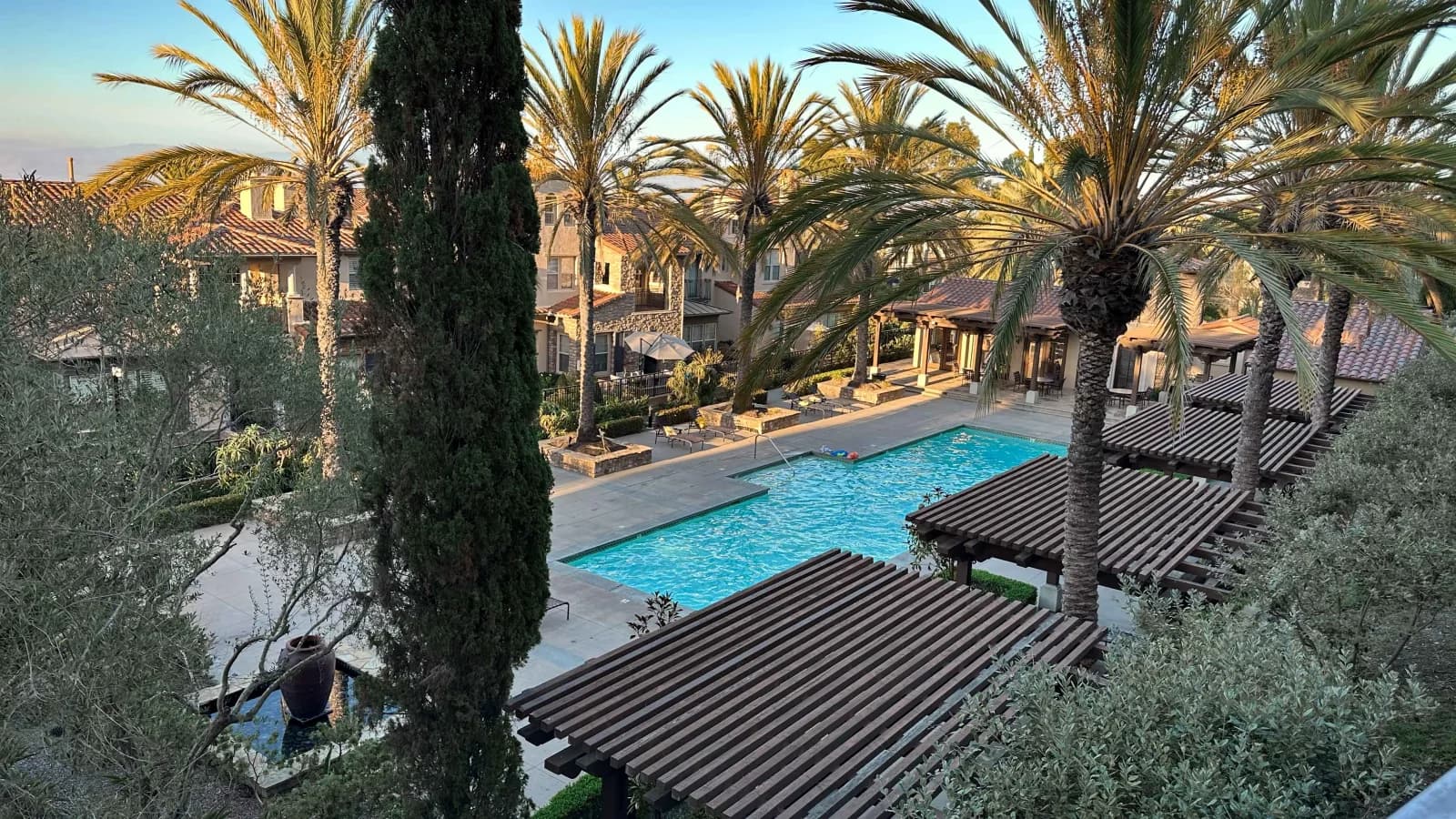 Ziani community pool and shaded seating